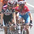 Andy and Frank Schleck discuss tactics during the race